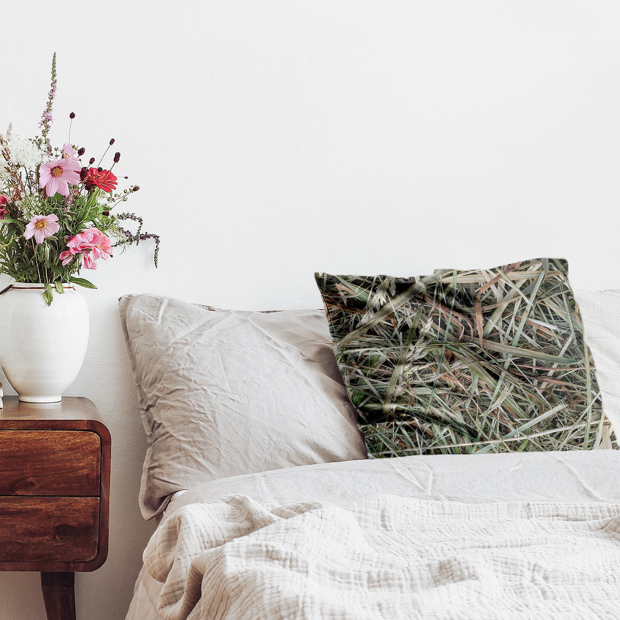 Almohada de salud blanca con paja