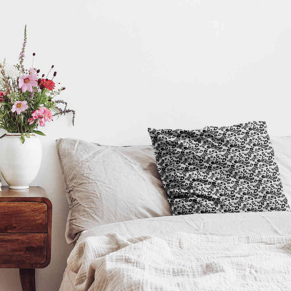 Cojín de salud con inscripción en negro Joker