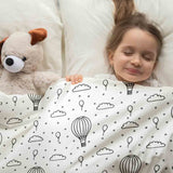 Set de ropa de cama con mantas terapéuticas y globos aerostáticos