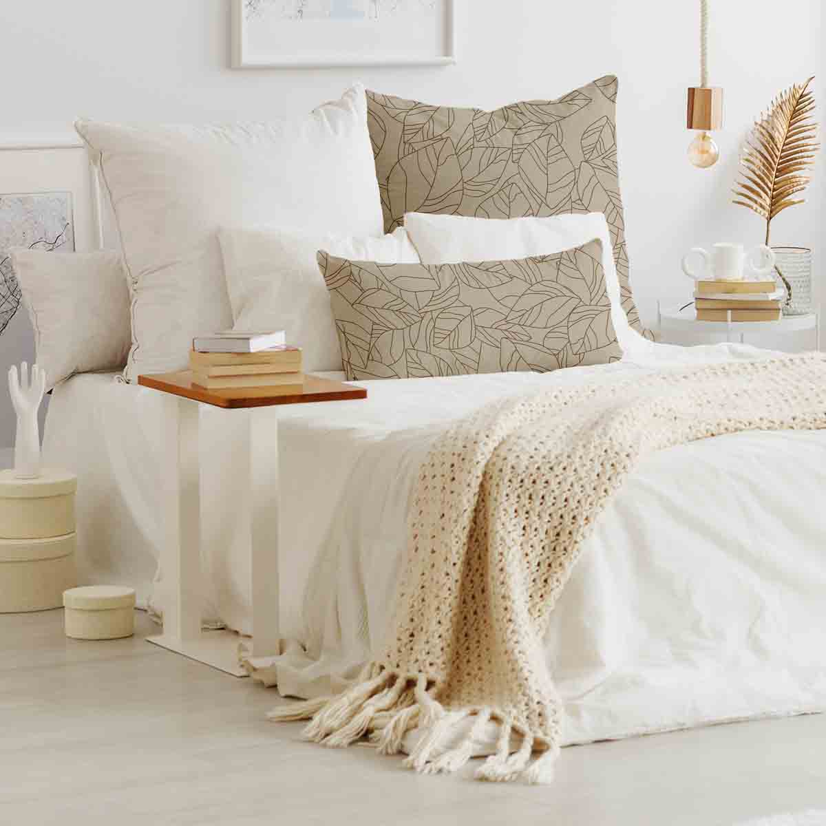 Almohada de salud beige con forma de hoja negra