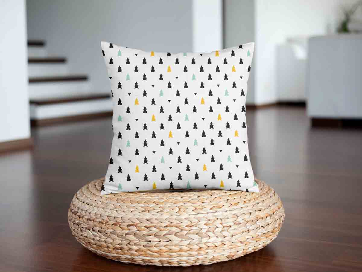 Almohada de salud blanca con pequeños abetos