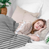 Juego de ropa de cama con manta terapéutica blanca con rayas negras