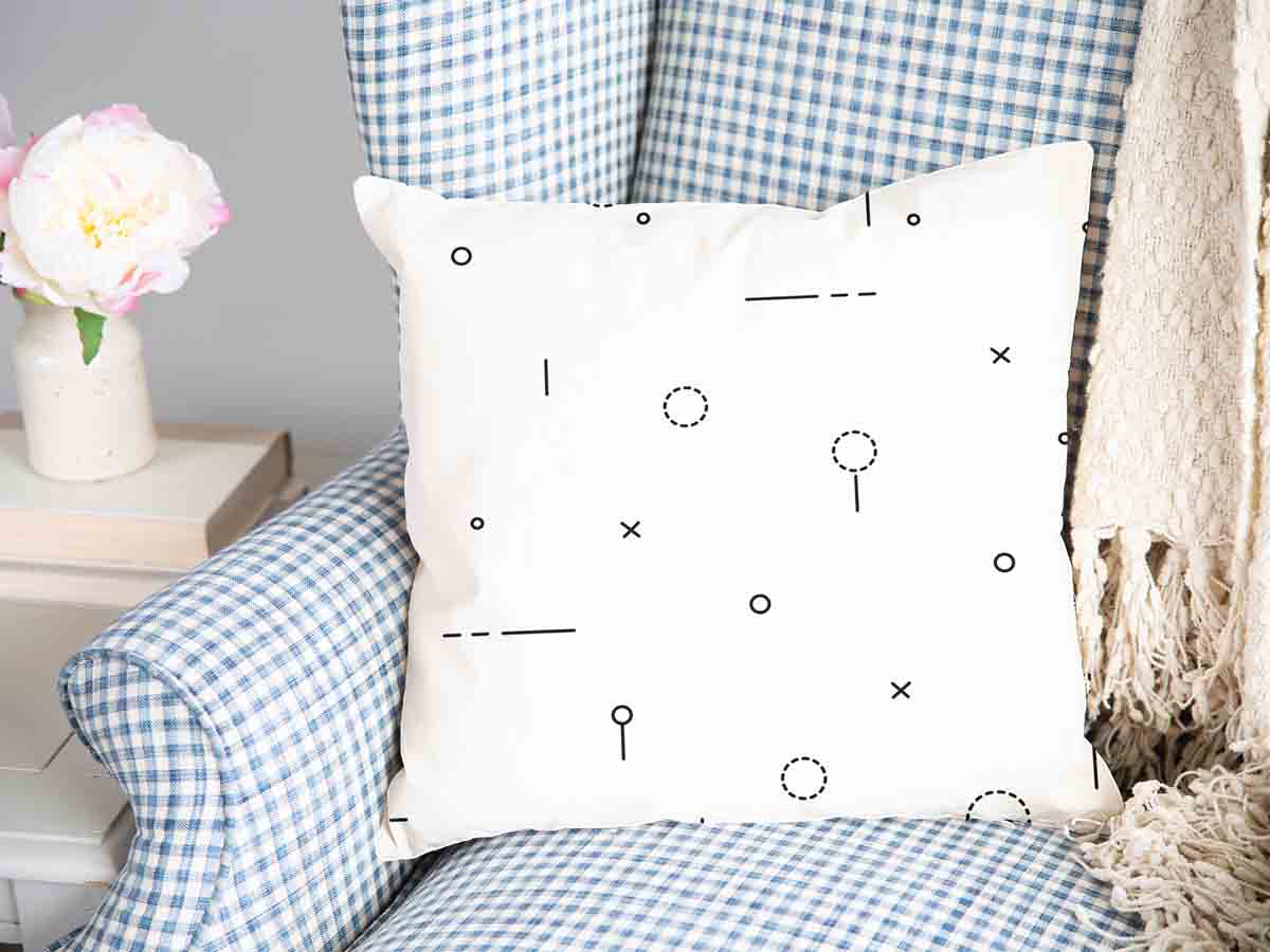 Almohada de salud blanca con formas negras