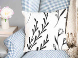 Almohada de salud blanca con ramas negras