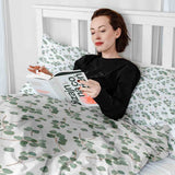 Juego de ropa de cama con mantas terapéuticas blancas con ramas de eucalipto
