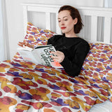 Juego de ropa de cama con mantas terapéuticas y manchas de colores