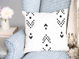 Almohada de salud blanca con patrón de flechas negras