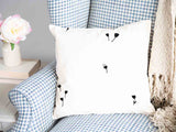 Almohada de salud blanca con dientes de león negros