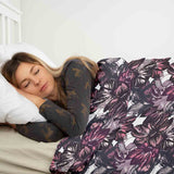 Set de ropa de cama con manta terapéutica y mar de flores moradas