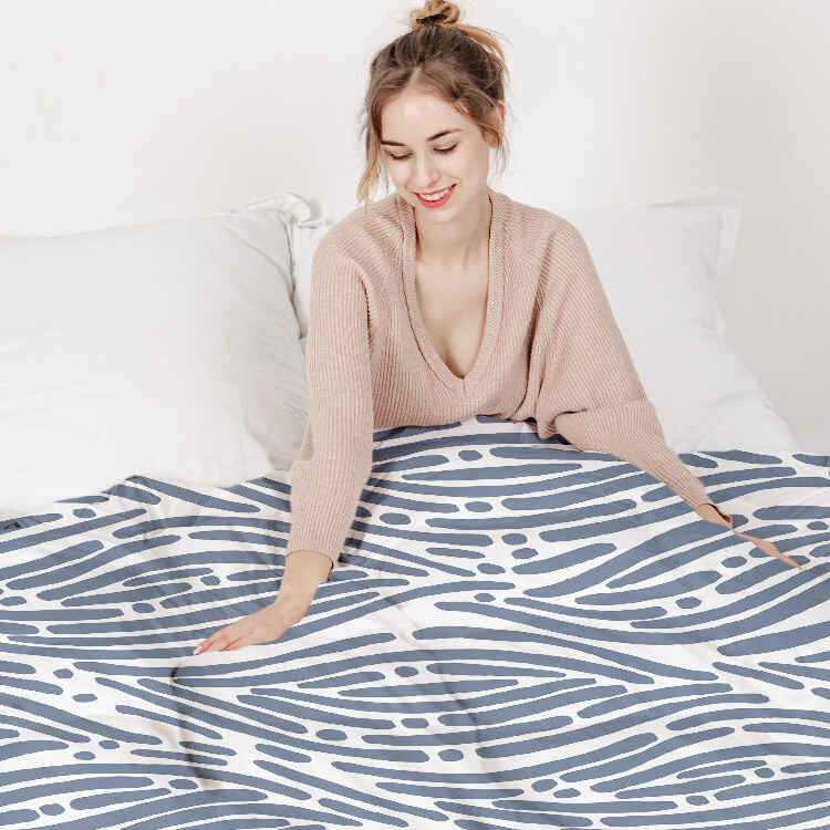 Set de ropa de cama con manta terapéutica patrón ondulado azul