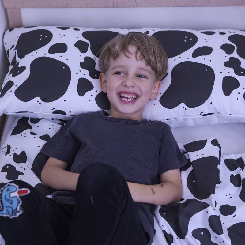 Almohada de salud con patrón de manchas de vaca para niños