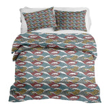 Set de ropa de cama con mantas terapéuticas y rompeolas coloridos