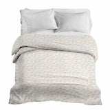 Set de ropa de cama con mantas terapéuticas con círculos naranjas