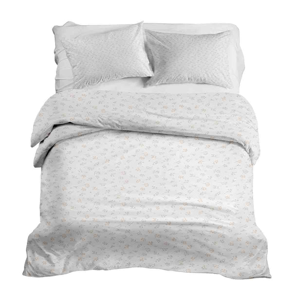 Set de ropa de cama con mantas terapéuticas y delicados ramos de flores