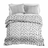 Set de ropa de cama con manta terapéutica blanca con motas grises