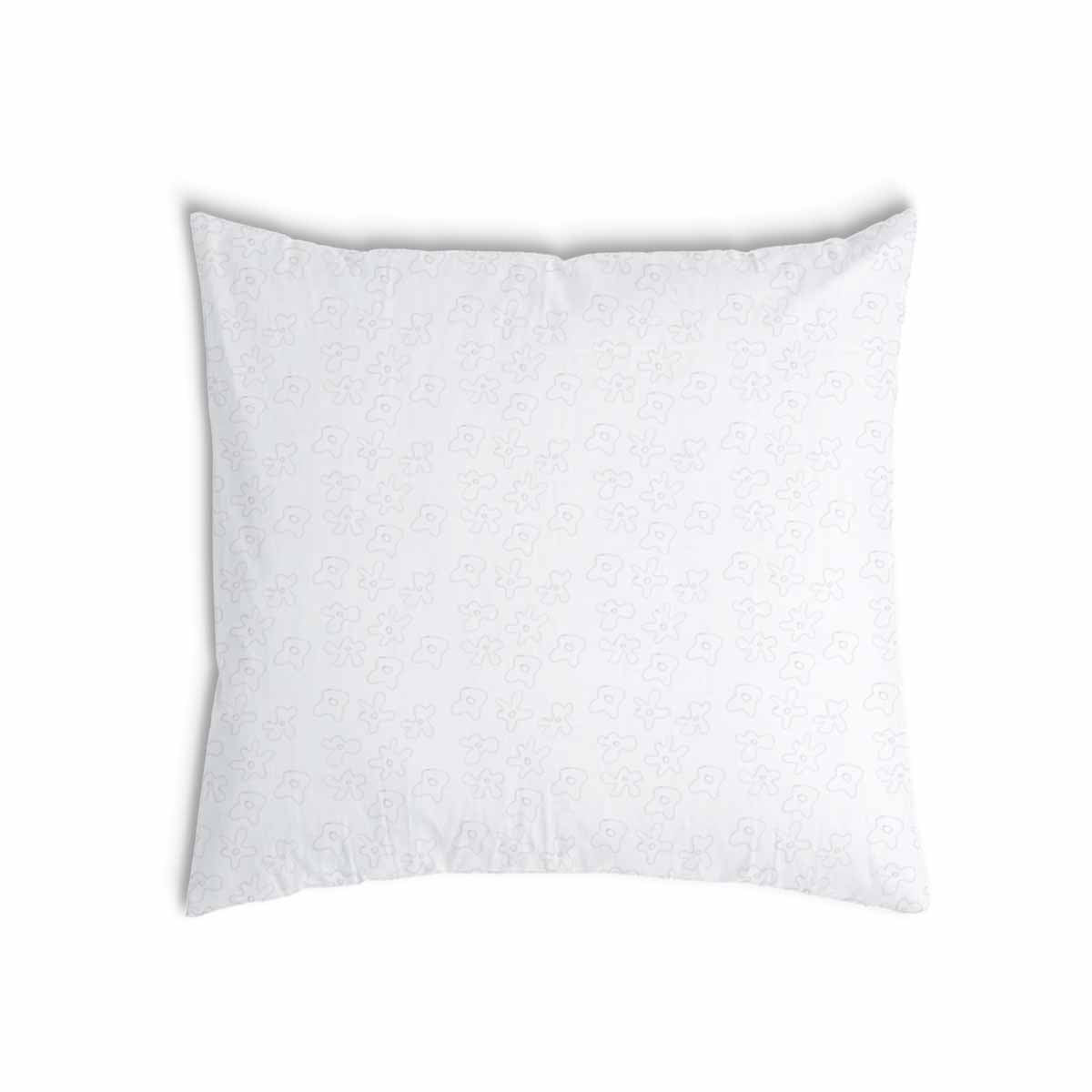 Almohada de salud blanca con delicadas flores