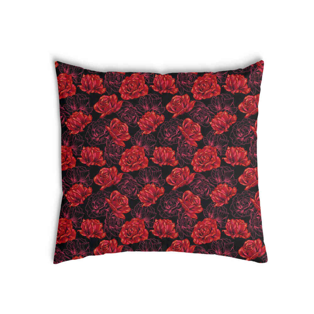 Almohada de salud negra con rosas rojas