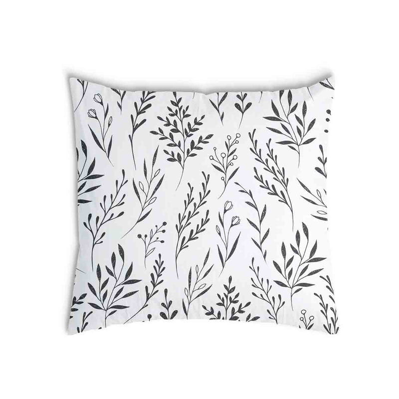 Almohada de salud blanca con ramas negras