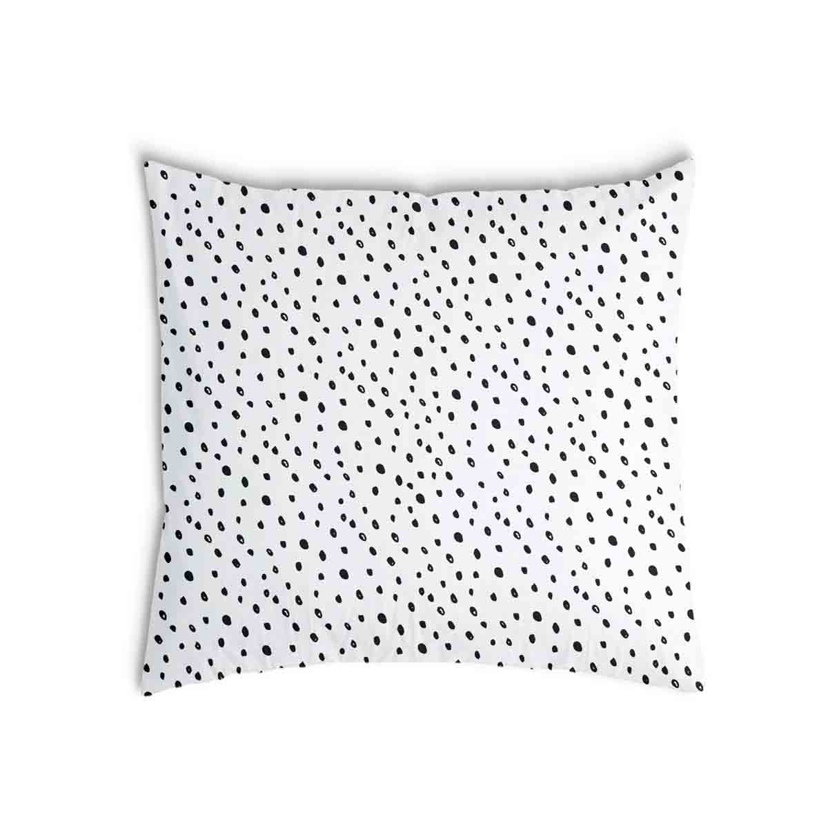 Almohada de salud blanca con muchos puntos pequeños