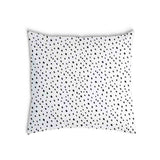 Almohada de salud blanca con muchos puntos pequeños