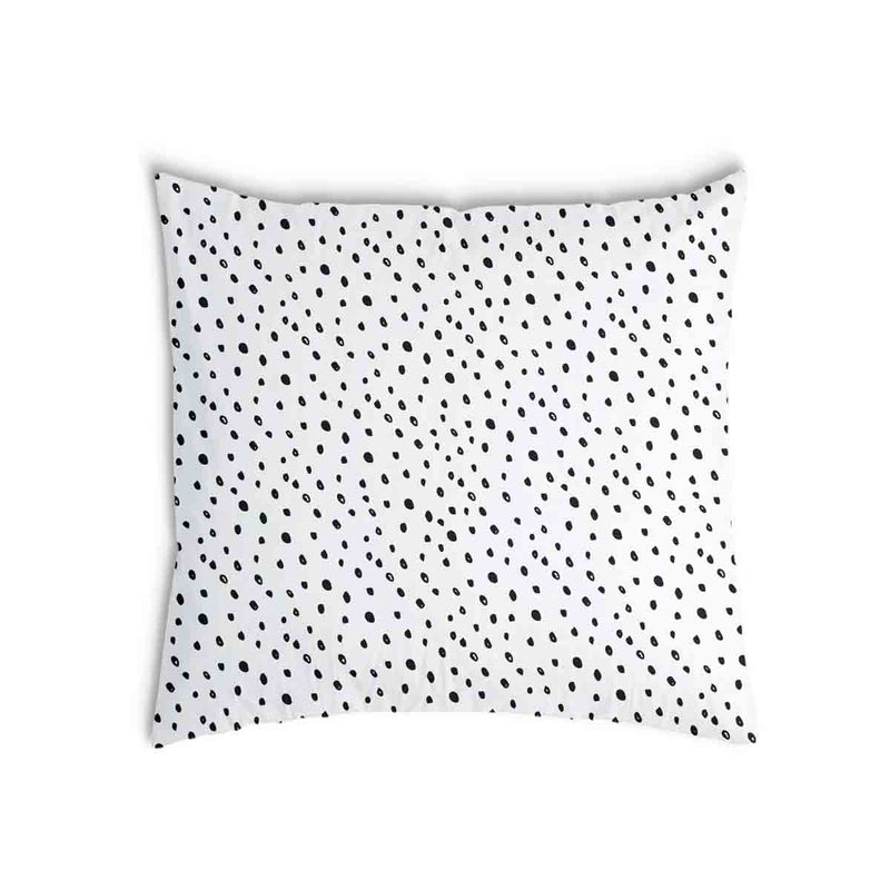 Almohada de salud blanca con muchos puntos pequeños