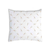 Almohada de salud blanca con dientes de león