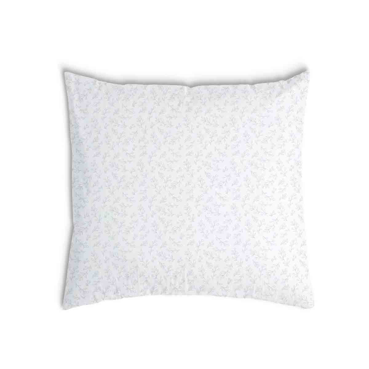 Almohada de salud blanca con delicadas ramas
