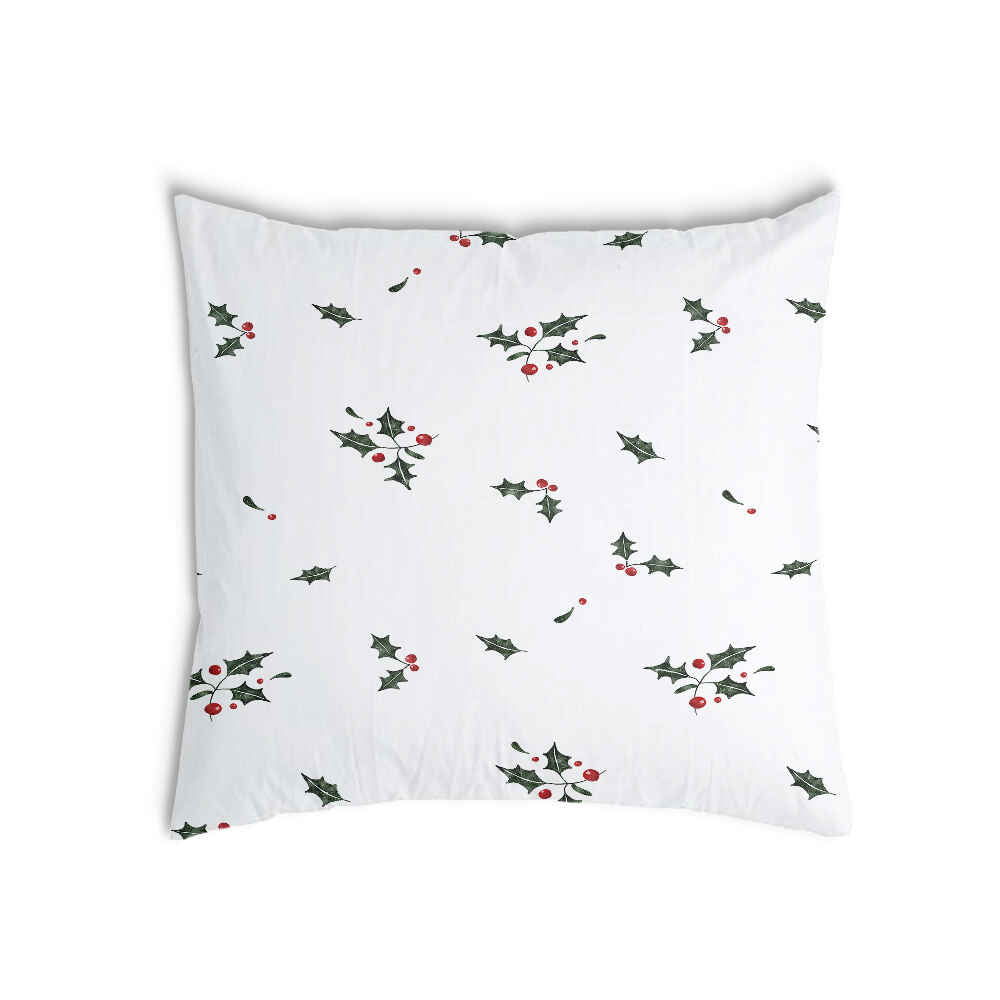 Almohada de salud blanca con ramas de muérdago
