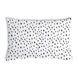 Almohada de salud blanca con muchos puntos pequeños
