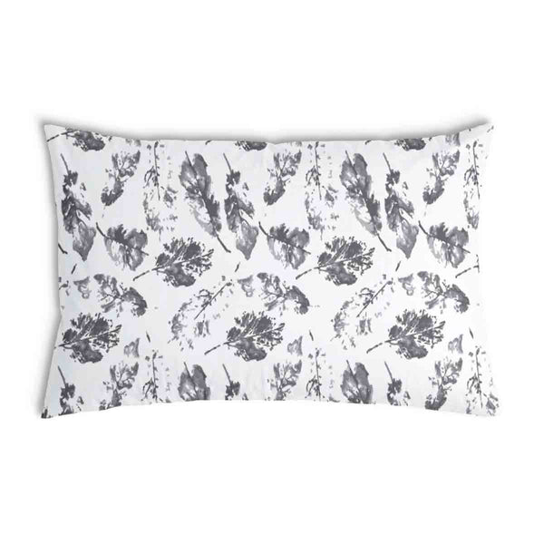 Almohada de salud blanca con hojas grises