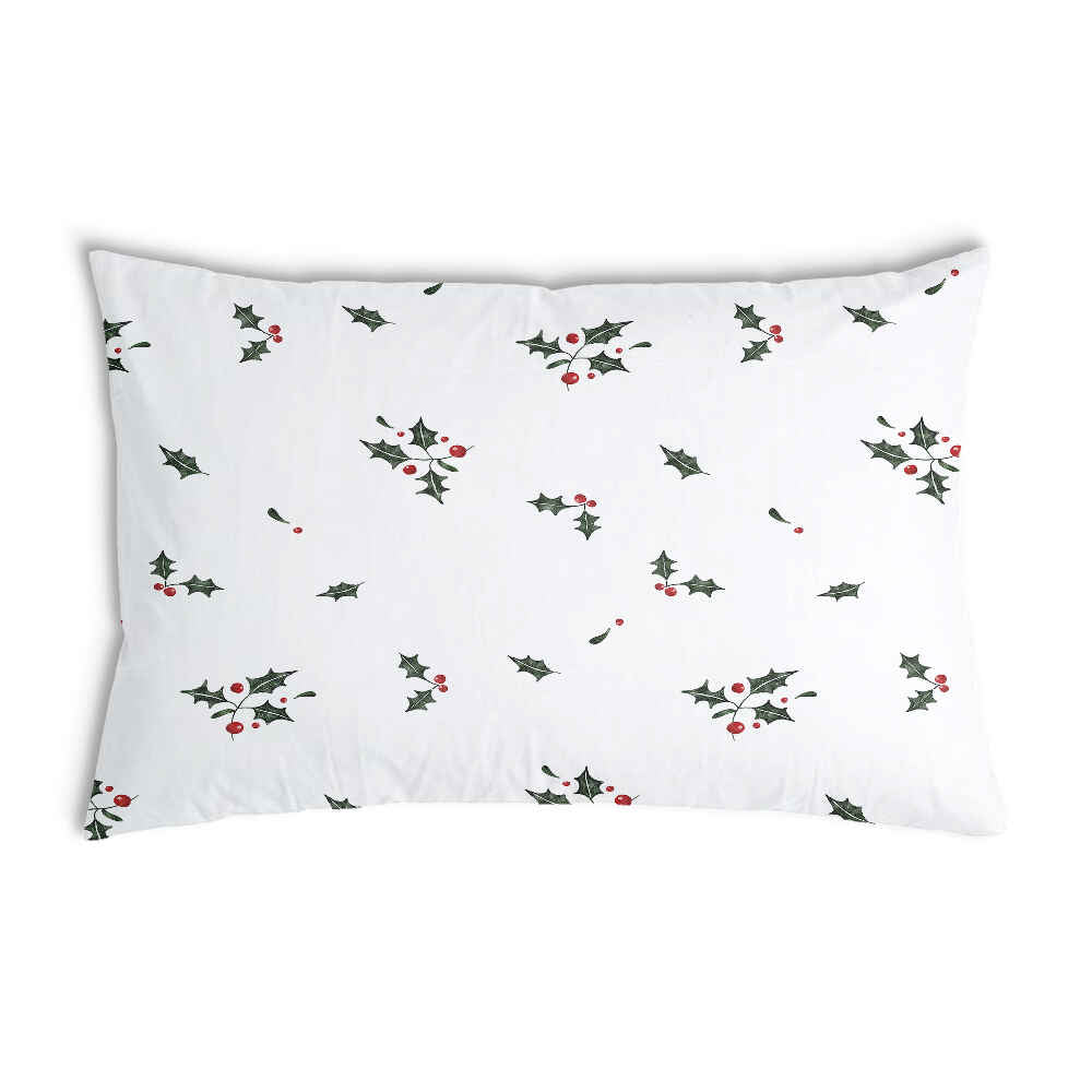 Almohada de salud blanca con ramas de muérdago
