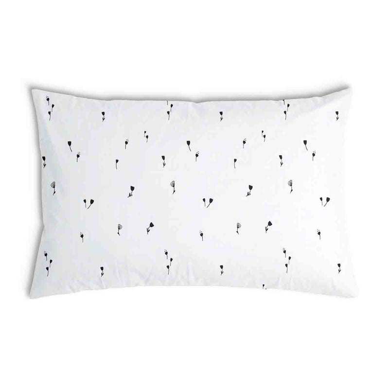 Almohada de salud blanca con dientes de león negros