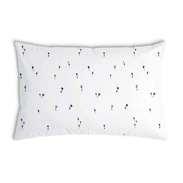 Almohada de salud blanca con dientes de león negros