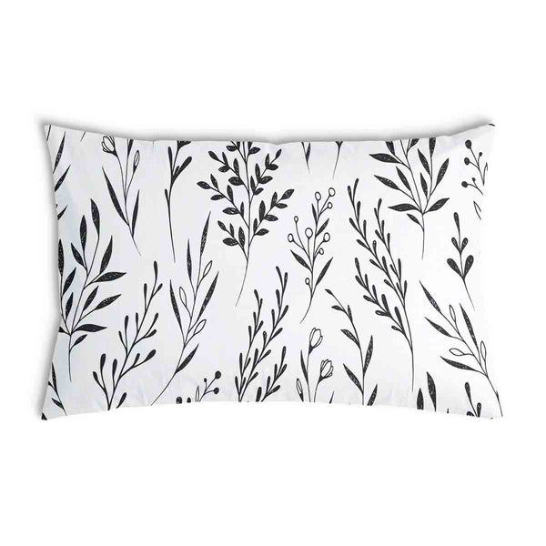 Almohada de salud blanca con ramas negras