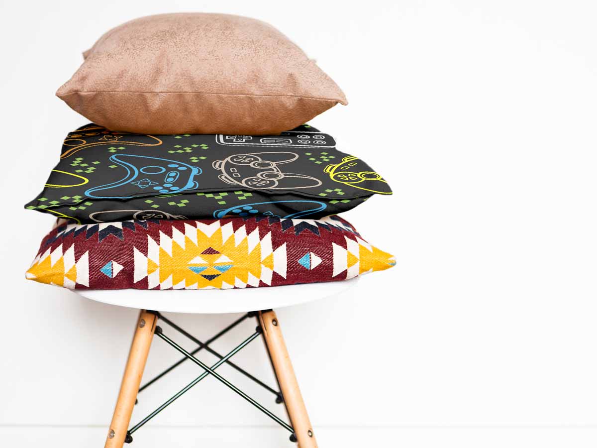 Almohada de salud negra con consolas de juegos