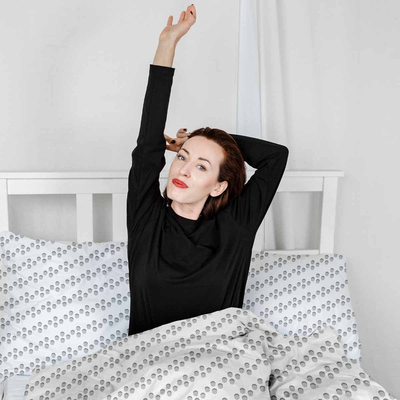 Set de ropa de cama con manta terapéutica blanca con círculos grises