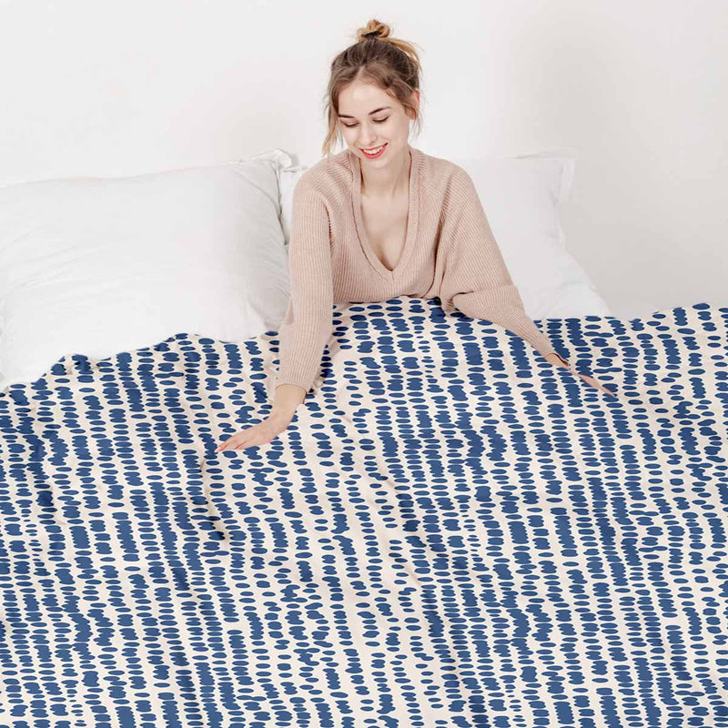 Set de ropa de cama con mantas terapéuticas y puntos azules