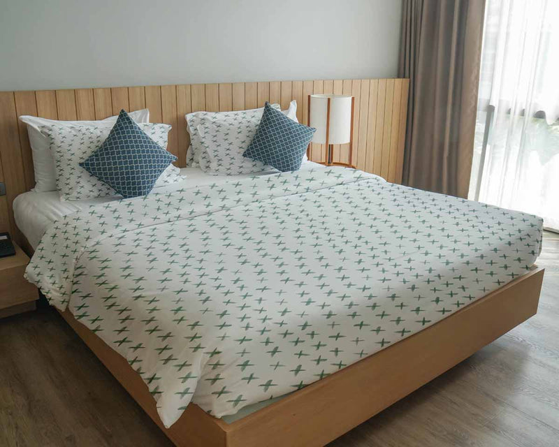 Set de ropa de cama con mantas terapéuticas con cruces verdes