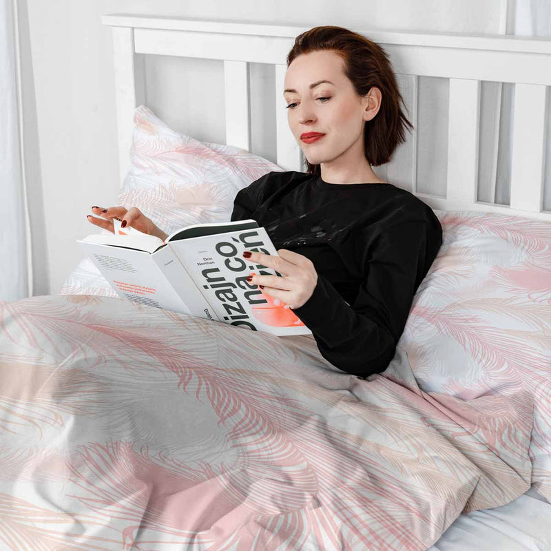 Set de ropa de cama con manta terapéutica blanca con plumas rosas