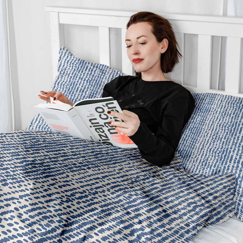 Set de ropa de cama con mantas terapéuticas y puntos azules