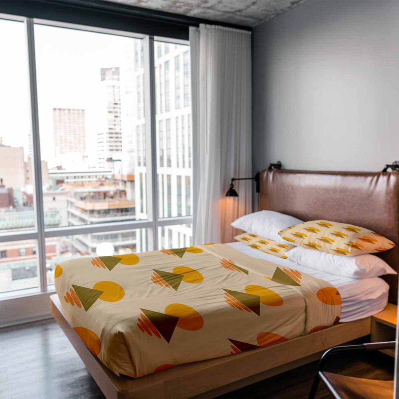 Set de ropa de cama con mantas terapéuticas y formas amarillas