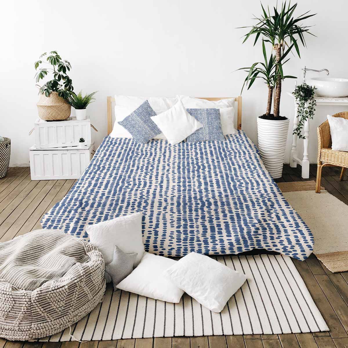 Juego de ropa de cama con mantas terapéuticas y puntos azules