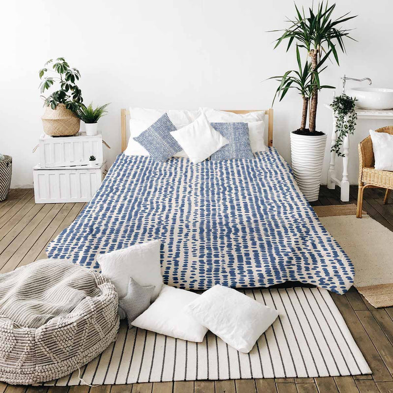Set de ropa de cama con mantas terapéuticas y puntos azules