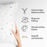 Almohada de salud blanca con formas coloridas