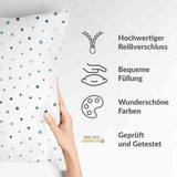 Almohada de salud blanca con pequeñas formas azules