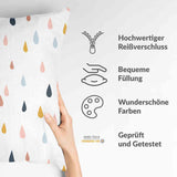 Almohada de salud con gotas de colores