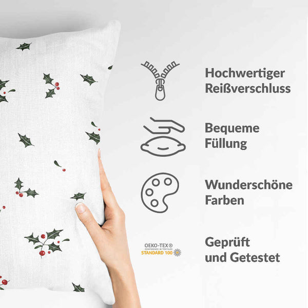 Almohada de salud blanca con ramas de muérdago