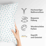 Almohada de salud blanca con corazones azules