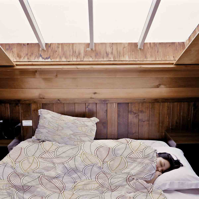 Juego de ropa de cama con mantas terapéuticas y hojas de palma coloridas