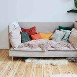 Almohada de salud verde con hoja dorada